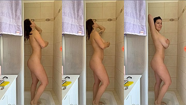 Mady Gio taking a shower in the bathroom