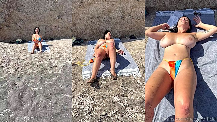 hot model Mady Gio relaxing in a bikini in the beach