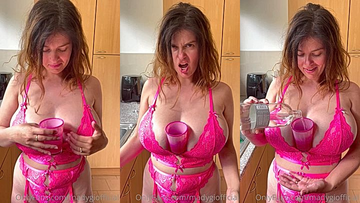 hot model Mady Gio use her huge tits to hold a cup and pure water