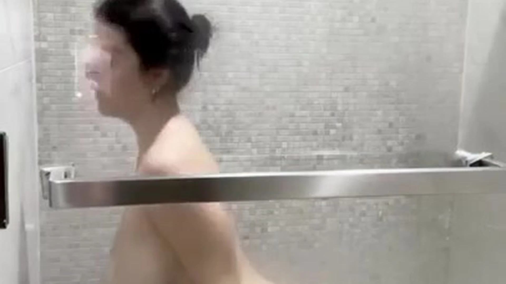 Mady Gio’s naughty tits squeeze in the shower